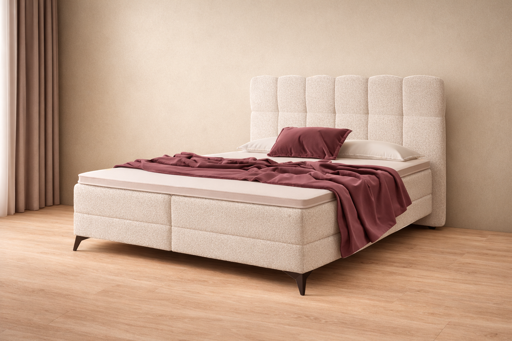 Boxspring Madison met aubergine plaid en kussen in lichte ruimte