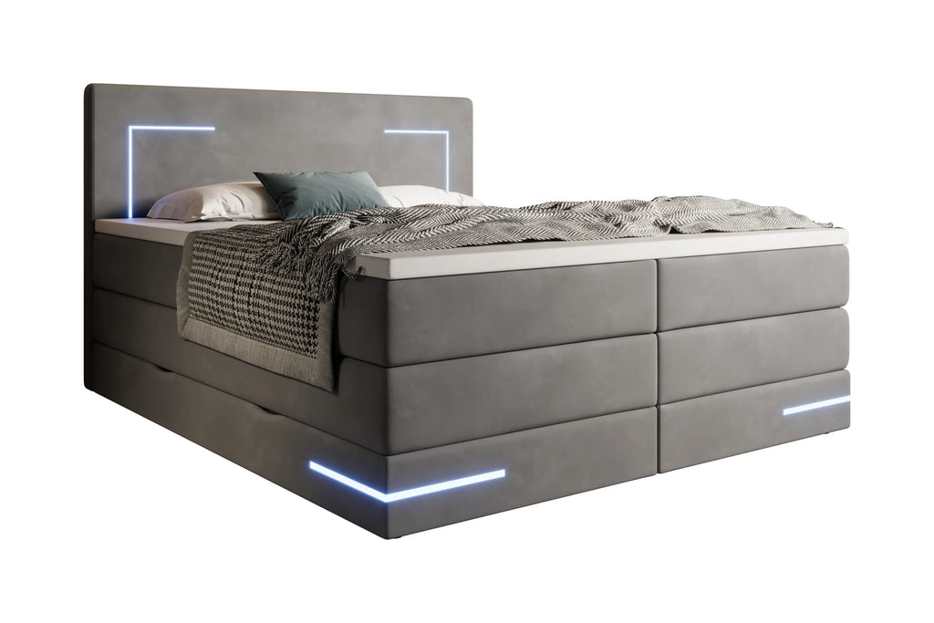 Boxspring Detroit diagonaal met sprei en kussens
