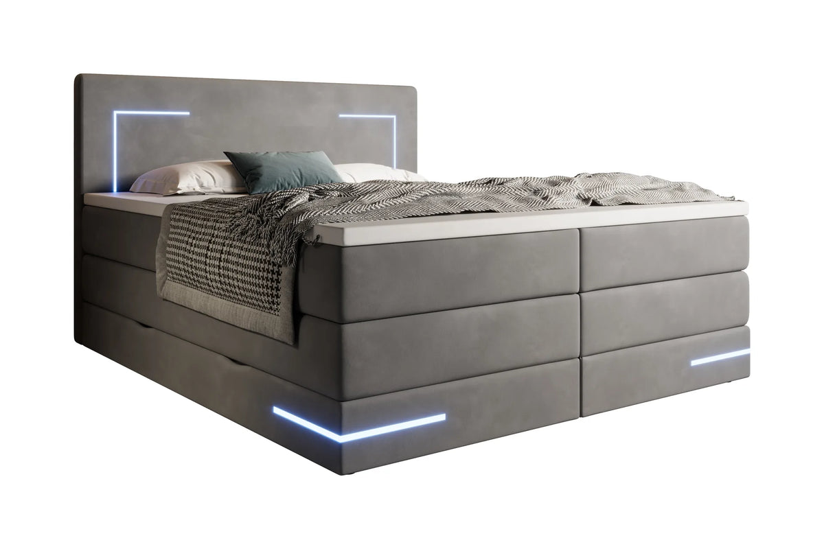 Boxspring Detroit diagonaal met sprei en kussens